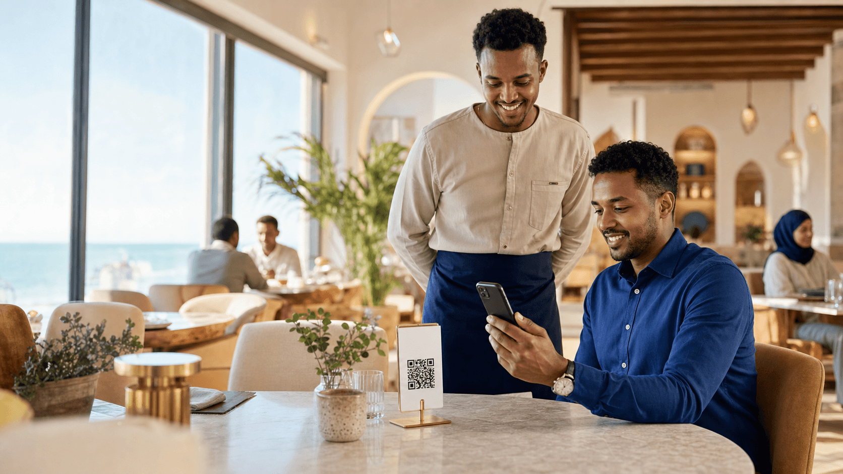 A guest scans the code on his table to tip the waiter who served him